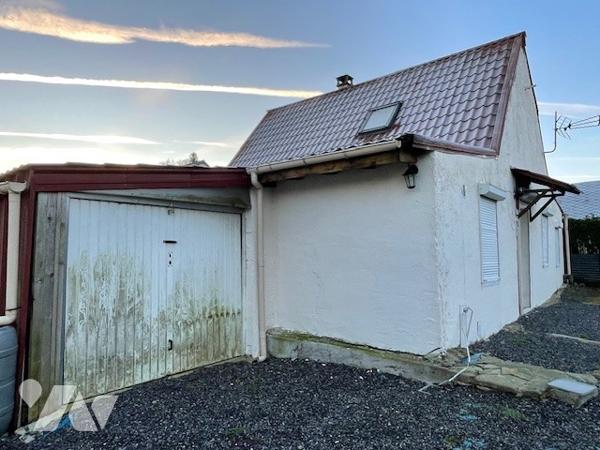 Maison avec cour et garage