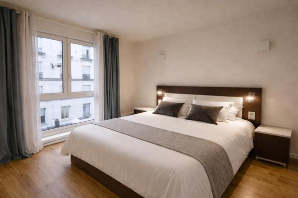 Appartement Paris 6 -ème Faux T3 -1 chambre + bureau - Ascenseur