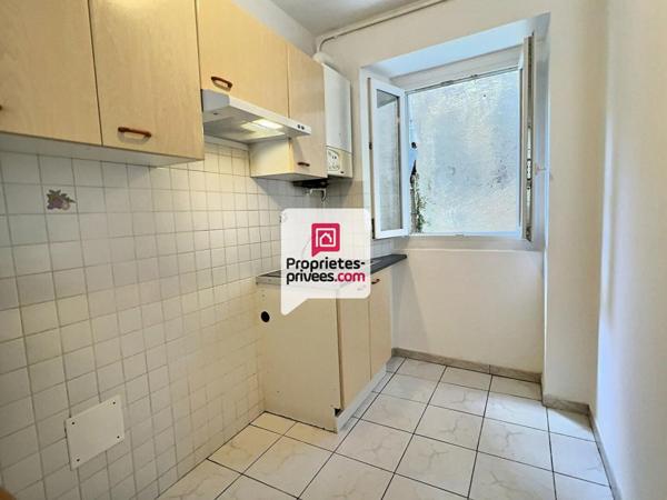 Ensemble immobilier avec 2 APT T1BIS + local Professionnel et cellier au coeur de SAINT-ASTIER (24110)