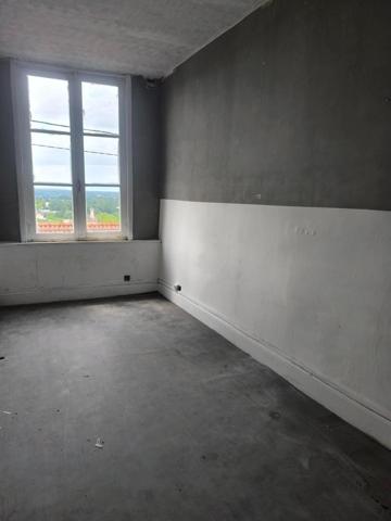 Maison de ville mitoyenne avec garage, beau volume, belle vue