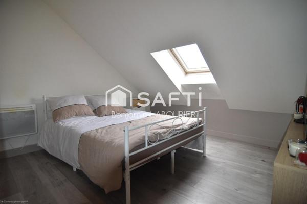 Immeuble de rapport avec garages et parking