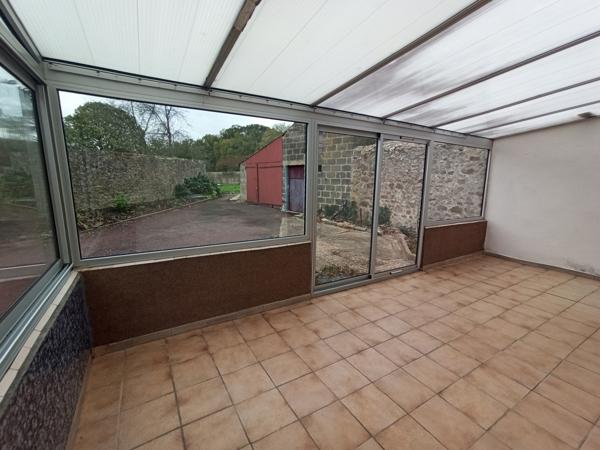 Maison de bourg avec joli terrain