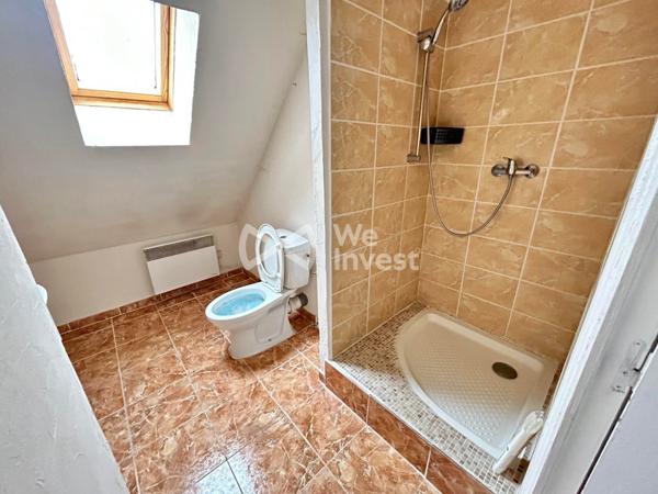 IMMEUBLE DE 362M² COMPRENANT : un F5 avec garage, deux F2, un F3, un F2 A RENOVER.