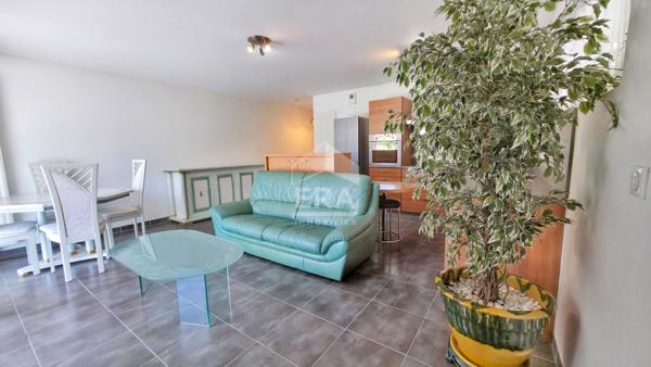 Appartement T4 avec balcon, cave, double garage, proche du lac