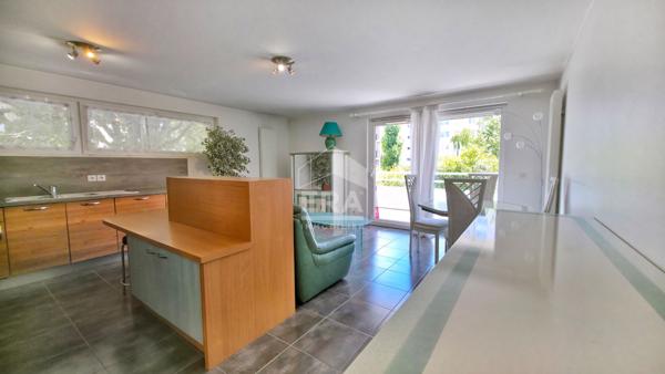 Appartement T4 avec balcon, cave, double garage, proche du lac