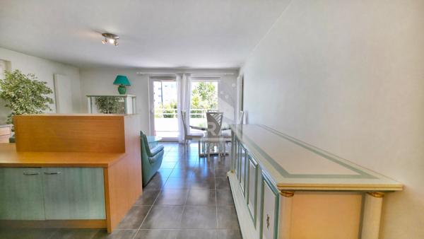 Appartement T4 avec balcon, cave, double garage, proche du lac