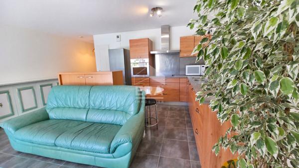 Appartement T4 avec balcon, cave, double garage, proche du lac