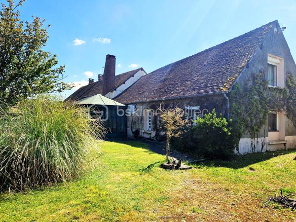 Découvrez cette propriété de caractère aux volumes généreux, idéale pour une grande famille, un projet de gîtes ou chambres d’hôtes, ou comme résidence secondaire. Située à 15 min de Houdan, sur le village de Cherisy et à moins de 45min de Paris, cette propriété est un havre de paix !

Implantée sur un terrain magnifiquement arboré et parfaitement entretenu, cette demeure de 11 pièces offre un potentiel remarquable et un cachet unique, tout en nécessitant quelques travaux de rafraîchissement pour révéler pleinement son charme.

Au rez-de-chaussée :
Un très beau salon central cathédrale, baigné de lumière, avec une belle hauteur sous plafond et sa grande cheminée avec insert, donne sur  une salle à manger attenante d’environ 23 m², qui s’ouvre sur une vaste véranda lumineuse, offrant une vue dégagée sur le jardin et un accès direct à une grande terrasse d’environ 40 m².
    • Aile droite : deux chambres, avec leurs salles de bain et WC privatifs, ainsi qu’un bureau pouvant servir de 3ème chambre.
    • Aile gauche : une grande cuisine, avec son arrière-cuisine, et un accès à une surprenante cave, ainsi qu’un atelier pouvant facilement être transformé en bureau spacieux ou espace professionnel (d'environ 25m2).

À l’étage :
    • Aile droite : une grande mezzanine surplombant le salon, agrémentée d’une magnifique cheminée avec insert, actuellement aménagée en salle de billard. Un couloir dessert ensuite deux grandes chambres, une salle de bain et un WC.
    • Aile gauche : deux grandes chambres supplémentaires (22m2 et 28m2), une salle d’eau attenante, deux pièces de rangement et un WC indépendant.

Extérieurs et annexes :
Avec ces 2 façades très différentes, vous retrouvez 2 ambiances. Côté jardin, une façade restée au naturel avec sa vigne vierge et côté entrée de la propriété, une façade joliment refaite pour un bel effet pierre.
Une dépendance complète l’ensemble, comprenant trois chambres froides, des espaces de stockage ainsi qu’un très grand garage motorisé d’environ 30 m².

Prestations techniques :
    • Pompe à chaleur récente (2023)
    • Chauffe-eaux thermodynamiques
    • Volets roulants 
    • Fibre optique (idéal télétravail)
    • Raccordement au tout-à-l’égout
    • Très bon DPE : C / GES : A

Les atouts :
Très beaux volumes, nombreuses possibilités d’aménagement, environnement paisible et verdoyant… une propriété rare sur le marché, parfaite pour concrétiser vos projets de vie ou d’accueil.

À découvrir sans tarder.