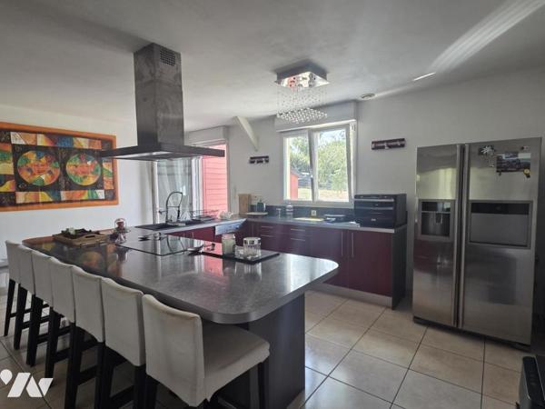 Maison individuelle plain pied 136m² habitables, quatre chambres sur terrain de 1078m²