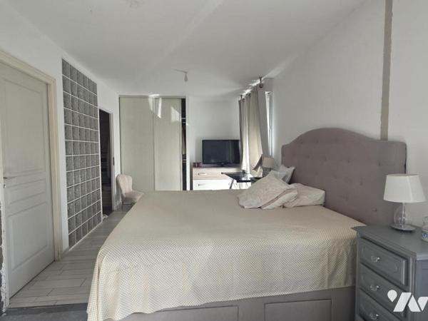 Maison individuelle plain pied 136m² habitables, quatre chambres sur terrain de 1078m²