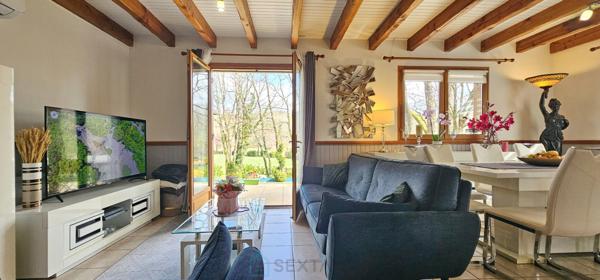Dans un cadre idyllique et relaxant, superbe chalet de 92 m² en parfait état, offrant confort, modernité et de très belles prestations.