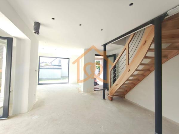 À Geispolsheim Village : Appartement avec garage, parking et un are de terrain