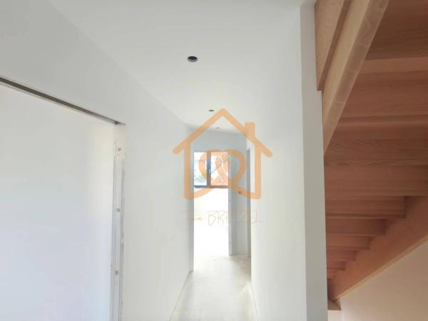 À Geispolsheim Village : Appartement avec garage, parking et un are de terrain