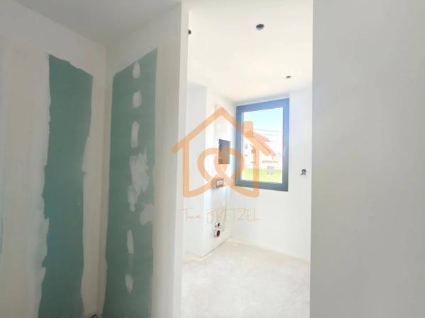 À Geispolsheim Village : Appartement avec garage, parking et un are de terrain