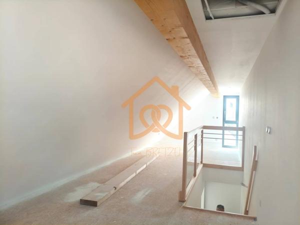 À Geispolsheim Village : Appartement avec garage, parking et un are de terrain