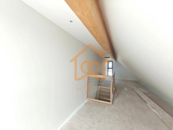 À Geispolsheim Village : Appartement avec garage, parking et un are de terrain