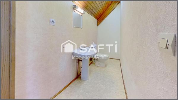 Maison individuelle avec véranda, garage et jardin