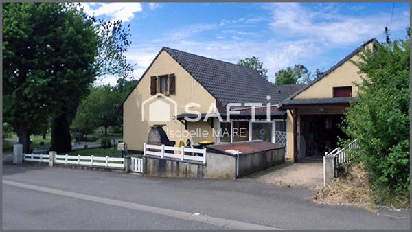 Maison individuelle avec véranda, garage et jardin