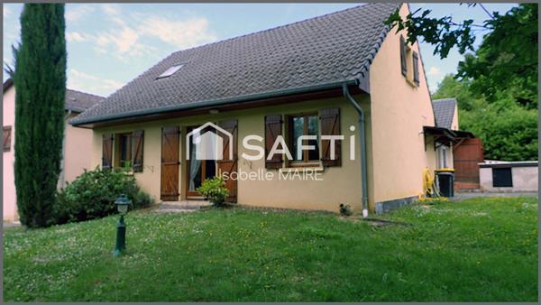Maison individuelle avec véranda, garage et jardin