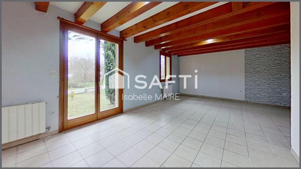 Maison individuelle avec véranda, garage et jardin