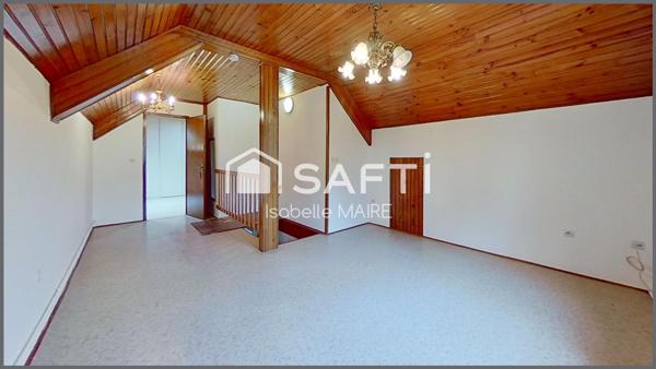 Maison individuelle avec véranda, garage et jardin