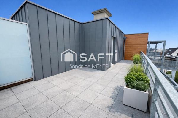 Superbe appartement F3 en attique, terrasse 24 m², balcon 9 m², garage en sous-sol, chauffage au sol