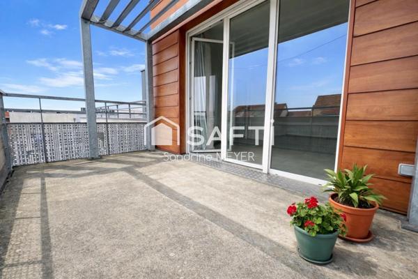 Superbe appartement F3 en attique, terrasse 24 m², balcon 9 m², garage en sous-sol, chauffage au sol
