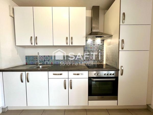 Superbe appartement F3 en attique, terrasse 24 m², balcon 9 m², garage en sous-sol, chauffage au sol