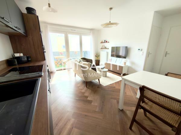 Appartement cocooning avec balcon et 2 stationnements – Résidence récente