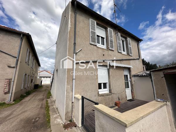 Proche centre Immeuble 8 appartements + 7  garages