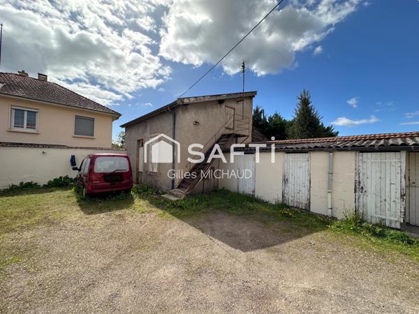 Proche centre Immeuble 8 appartements + 7  garages