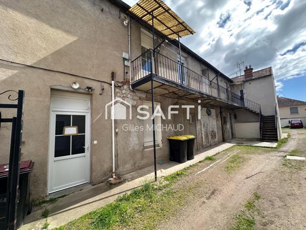 Proche centre Immeuble 8 appartements + 7  garages