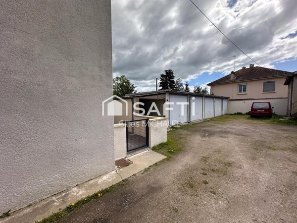 Proche centre Immeuble 8 appartements + 7  garages