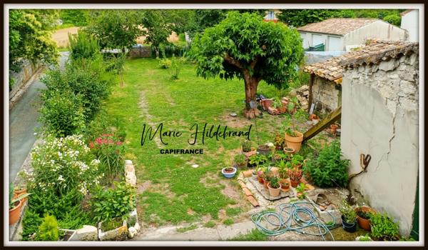 Maison en pierre - 105m² habitable - 750m² de jardin - 2 chambres - dépendance