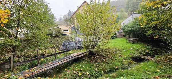 Ossature bois 131 m² DPE B Jardin et forêt