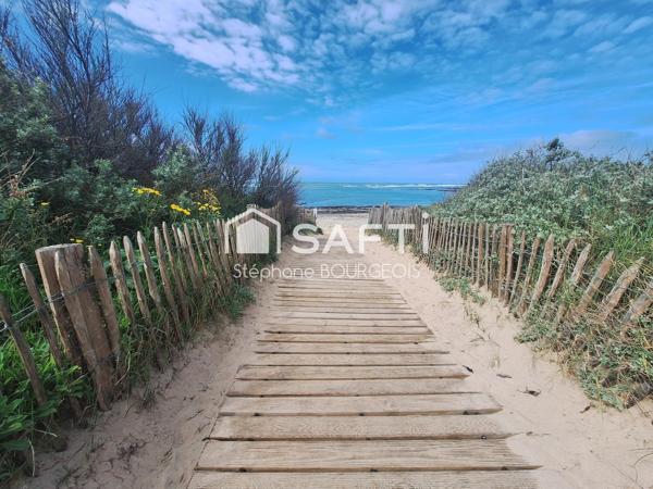 Maison de vacances sur la plage avec jardin extérieure