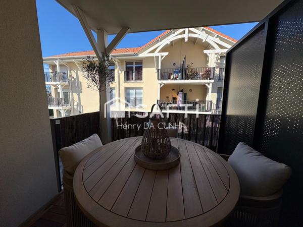 T2 récent avec balcon et parking souterrain