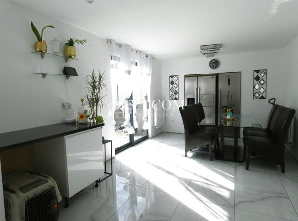 Maison 4 pièce(s) 2 chambre(s) 98 m²