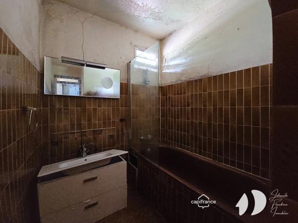 Petit-Bourg – Maison à rénover avec fort potentiel sur terrain constructible de 2 312 m²