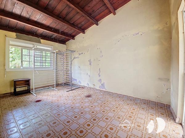 Petit-Bourg – Maison à rénover avec fort potentiel sur terrain constructible de 2 312 m²