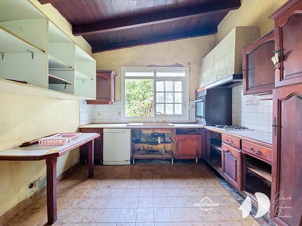 Petit-Bourg – Maison à rénover avec fort potentiel sur terrain constructible de 2 312 m²