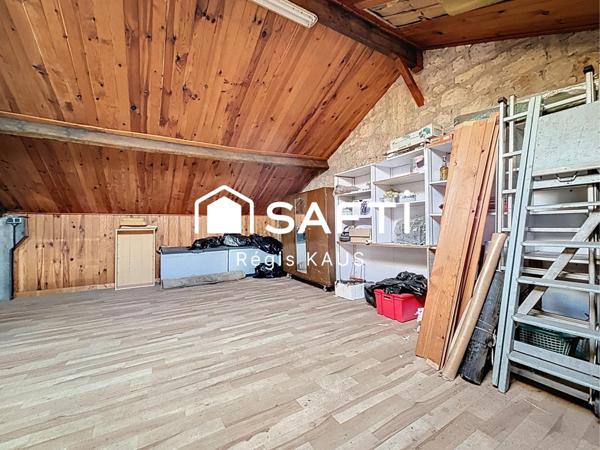 Potentiellement habitation, garage ou atelier avec jardin au centre de Luçon