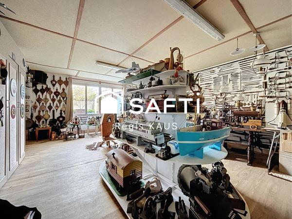 Potentiellement habitation, garage ou atelier avec jardin au centre de Luçon