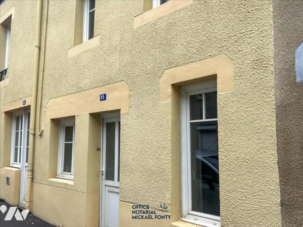 COUTANCES Maison de ville avec un terrain