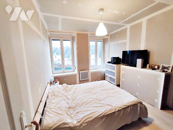 Maison mitoyenne à 2 pas du centre.