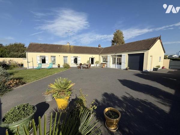 Maison de plain-pied dans le bourg de Portbail