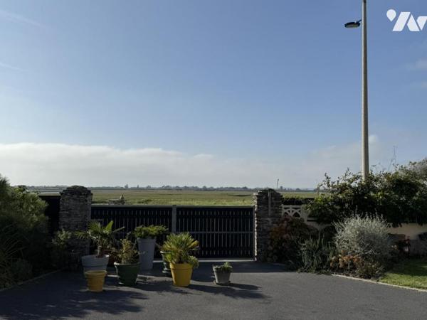 Maison de plain-pied dans le bourg de Portbail