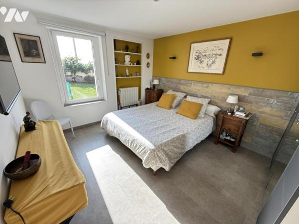 Maison de plain-pied dans le bourg de Portbail