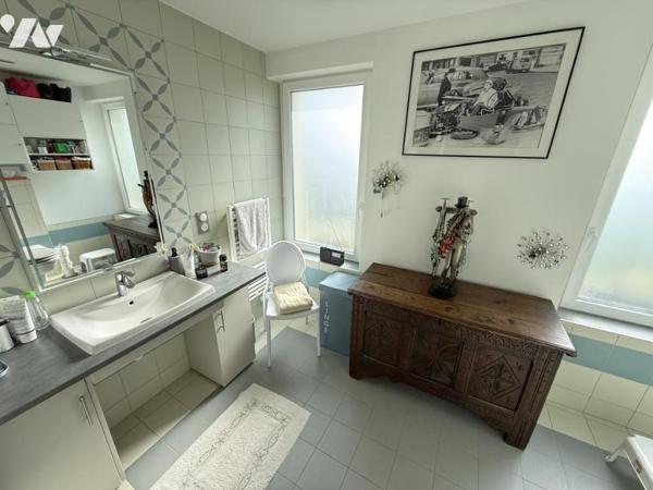 Maison de plain-pied dans le bourg de Portbail