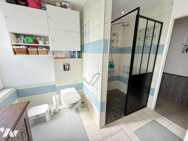 Maison de plain-pied dans le bourg de Portbail